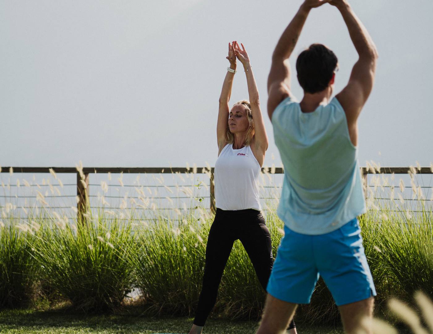 Yoga session in the Erika garden of the wellness hotel near Merano
